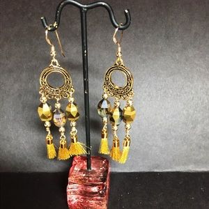 Tassels and beads gold earrings.